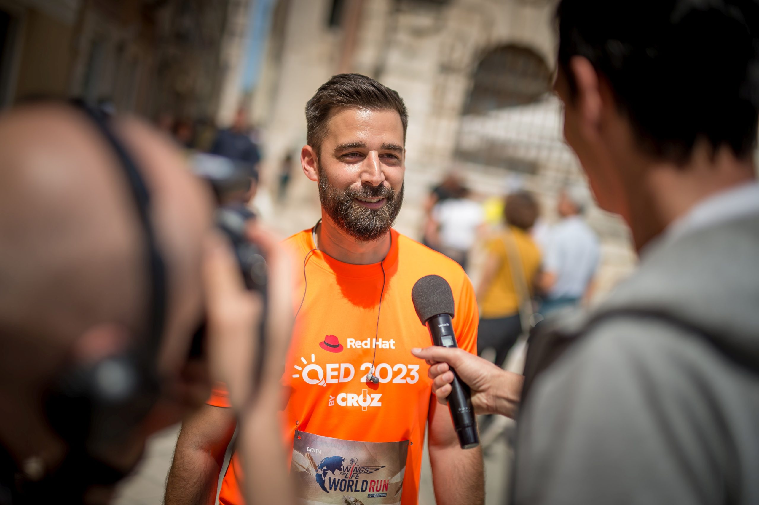 qed 2023 conference participant at wings for life race in zadar